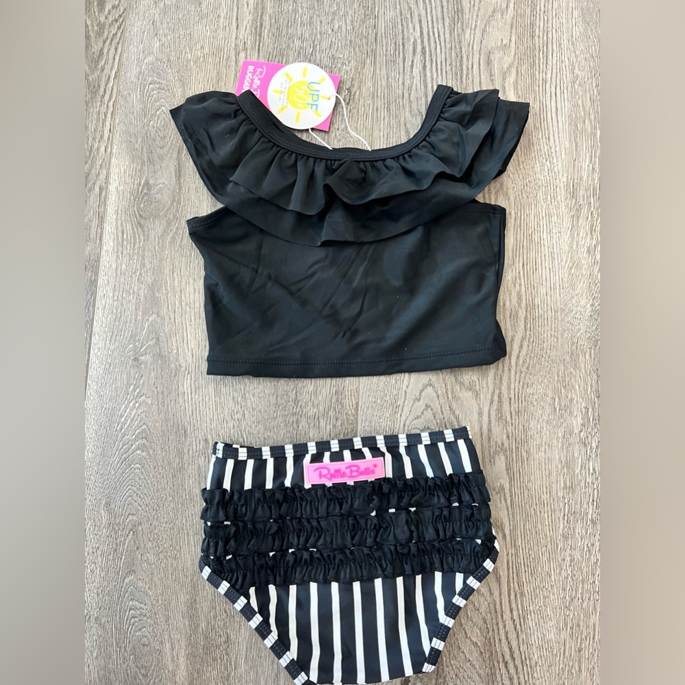 Ruffle Butts black and white stripe ruffled tankini. 2T